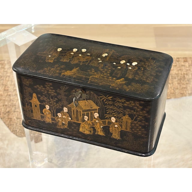This antique tea caddy is in remarkable condition for its age. The decoration is finely executed with detailed gilt...