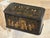 This antique tea caddy is in remarkable condition for its age. The decoration is finely executed with detailed gilt...
