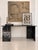 A sophisticated one-of-a-kind desk combining a vintage marble base with a custom smoke-grey glass top. Created by our...