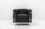 Our version of the Fauteuil Grand Confort, petit modèle, has a black leather and chrome finish frame, it originates from...