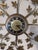 This vintage large 1960s United Leaf Electric Wall Clock in Goldtone is a stylish and functional addition to any living...