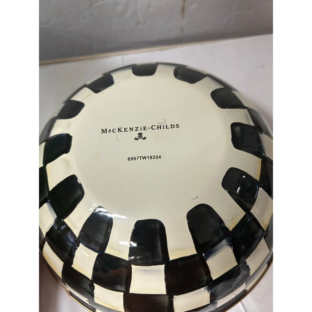 beautiful bowl by Mackenzie Childs features their famous checker pattern with a cream interior. would look great in a...