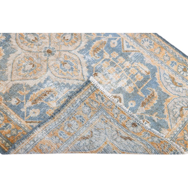 Beautiful vintage Persian Malayer hand-knotted shabby chic wool rug with a navy blue field. This piece has a rust frame...