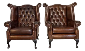 Pair of Vintage English Tufted Leather Wingback Armchairs