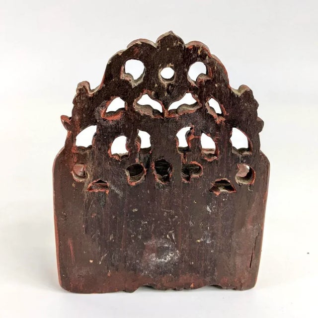 This is a rare find - a miniature hanging wall pocket with finely detailed carving