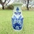 A beautifully proportioned vintage Chinese porcelain vase featuring hand-painted cobalt blue decoration on a soft celadon...