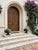 Pair of Vintage Neo-Classical Cast Iron Style Garden Urns – Matte Black For Sale - Image 10 of 12
