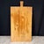 French bread board or charcuterie board, handcrafted from solid hardwood pine with a shaped handle and a warm, naturally...