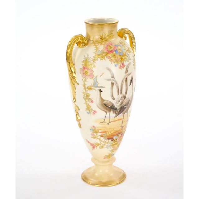 Crafted in the 19th century by the renowned Royal Bonn Company in Germany, this exquisite porcelain vase exemplifies the...