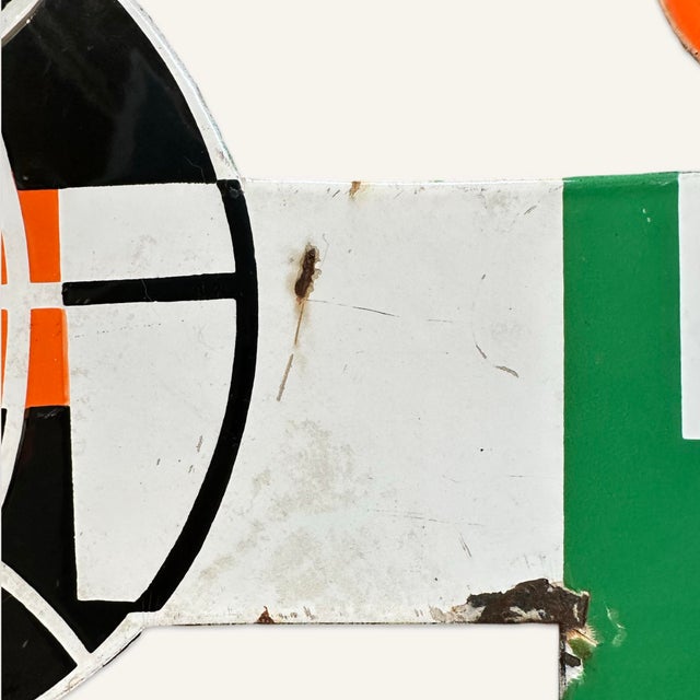 This “Casino” sign by Cassandre advertises a French grocery store chain. The sign is enameled, and the figure carries a...