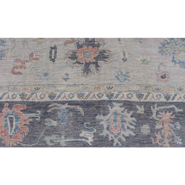 Textile Modern Oushak Rug With Slate Blue Border and Colorful All-Over Tribal Motifs For Sale - Image 7 of 15