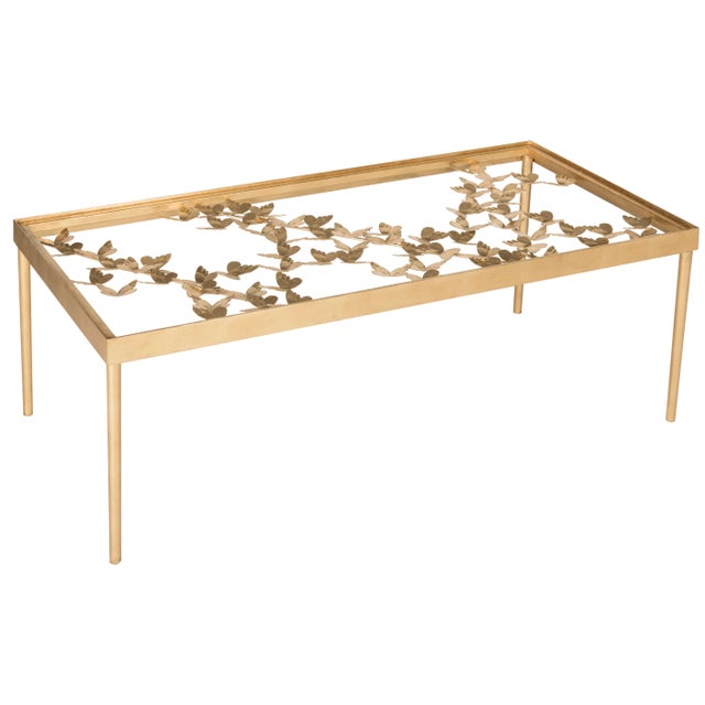 This butterfly coffee table was inspired by a handcrafted piece created by master goldsmiths for a Italian princess’...