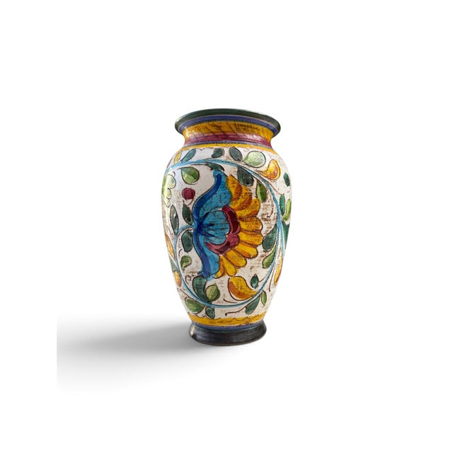 Charming vintage Italian hand-painted ceramic vase featuring an exuberant floral motif in rich shades of golden yellow,...