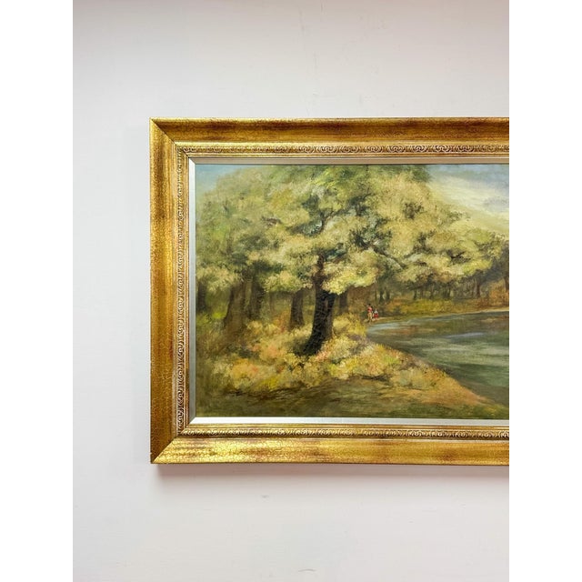 This evocative vintage impressionist landscape oil painting captures a serene river fishing scene in a warm, earthy...