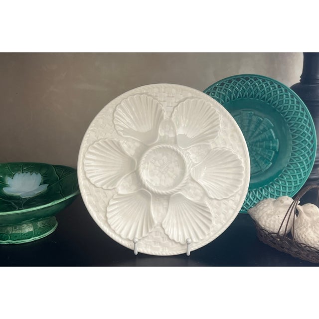 Classic Longchamp solid white oyster plate made in France around the 1960's. Six wells over a basketweave pattern....