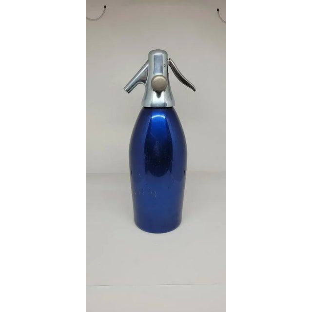 N. 1 sifone seltz 1960s in anodized aluminum and chromed metal, all marked, autoseltz mod. 56 designed by the famous...