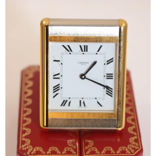 Cartier Santos 24-karat gold-plated and steel Art Deco travel quartz desk clock with alarm. Les Must de Cartier travel...
