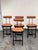 Design Plus Gallery presents a Set of Four Custom Design Swivel Faux Leather Counter Stools from Michael Oren Design. In...