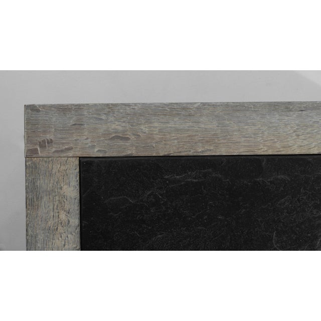 This exquisite 20th-century Belgian coffee table combines rustic charm with refined functionality. Crafted from bleached...