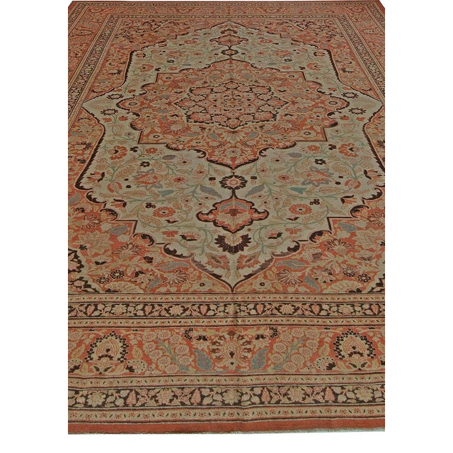 Antique Tabriz rugs are widely known for their diversity, as they can range from flat to high pile weaves. Patterns of...