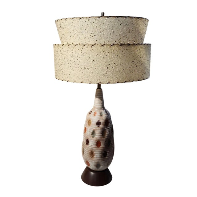 Unique design mid century modern tall ceramic table lamp, in excellent working condition. Multi color atomic dot pattern,...