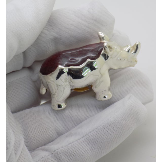 Steeped in the prestigious silvermaking legacy of Rome, this solid 925 sterling silver rhinoceros miniature by Ottaviani...