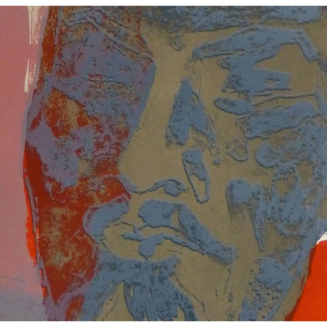 French lithograph of the abstracted iconic face of Lenin set in bold blocks of color by artist Paul Guiramand, circa 1965....