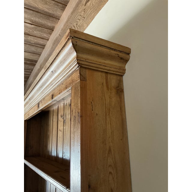 Offered is a charming rustic pine wall-mounted hutch, crafted in a classic European farmhouse style and finished in a warm...