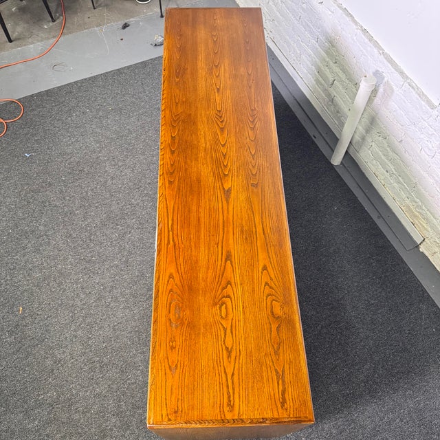 MCM Oak 12 Drawer Campaign Style Low Dresser by Founders For Sale - Image 10 of 11