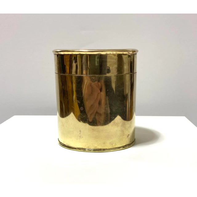 A classic vintage brass tobacco jar with hinged lid and warm polished finish. These jars were originally used for tobacco...