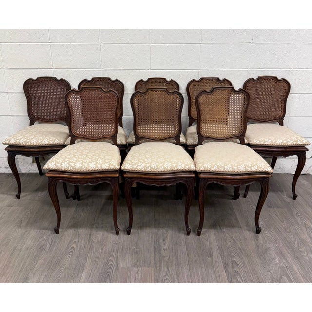 This is a gorgeous set of 8 vintage, possibly antique, French Country Louis XV style cane-back and cane seat dining chairs...