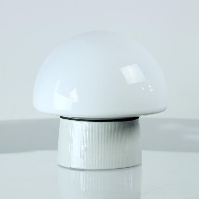 Beautiful wall or ceiling light. Produced in Czechoslovakia in 1960s. The base is made of off-white ceramic. The shield is...