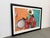Design Plus Gallery presents a Framed Photograph of “Hot Eight Bass Section, NOLA” by Elsa Hahne. This vibrant color...