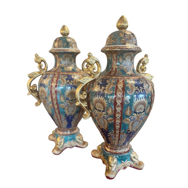 A striking pair of vintage oriental accents vases, generously scaled and beautifully detailed. These lidded vessels make a...