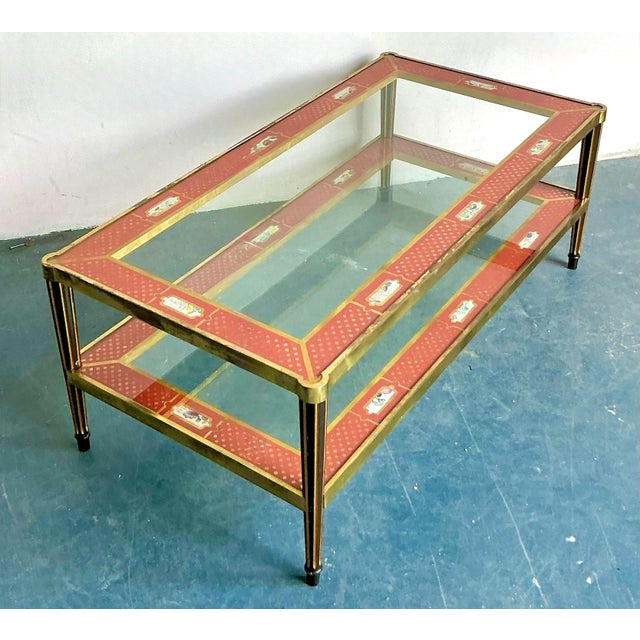 Capture the essence of classic Hollywood glamour with this exquisite two-tier coffee table. The piece is masterfully...