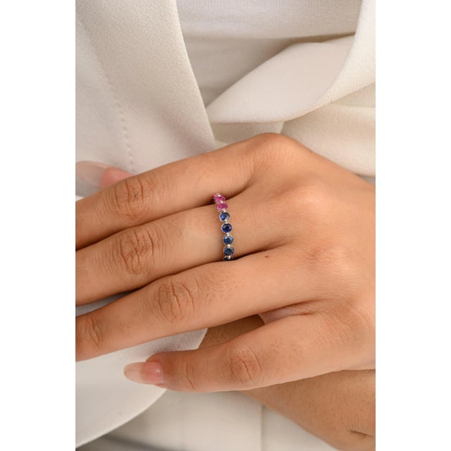 This is part of Chairish’s Fine Jewelry assortment. Handmade Rainbow Multi Gemstone Eternity Band Ring in 14K Gold...