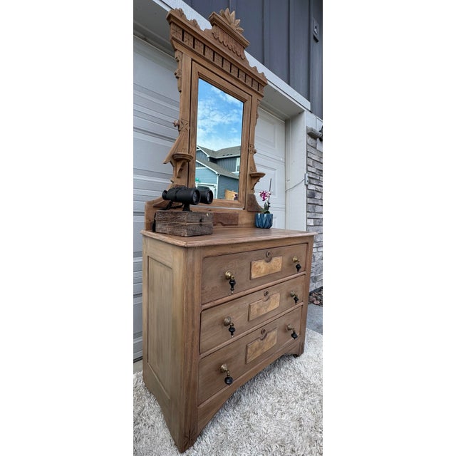 Turn back time with this stunning antique dresser, beautifully preserved and thoughtfully staged to highlight its classic...