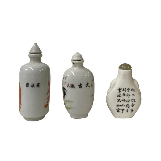 These three Chinese snuff bottles are made of porcelain, the surface is hand-painted with orange 18 lohons / Rooster /...