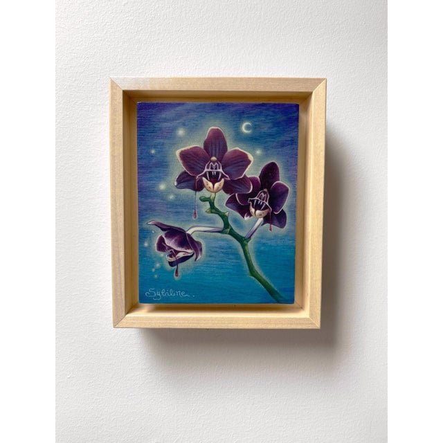 The artwork features a striking composition of dark orchids, with vivid details that emphasize their haunting beauty. The...