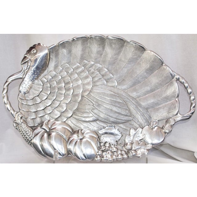 A discontinued from production, Lenox turkey platter. Very detailed with handles at both ends. On the bottom are also...