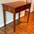 A charming antique Georgian side table. dating from around the early 1800s. It is a charming size for a foyer, hall or for...