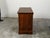 An English Georgian period oak chest from the early 19th century, with four drawers and carved motifs. Created in England...