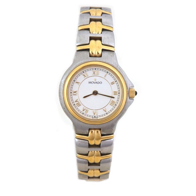 This is an authentic vintage Movado stainless steel two tone women's wristwatch. The two tone case has a brush finish with...