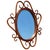 Late Victorian Thonet style scrolling bent oak oval wall mirror features a rich brown wooden bentwood or hand-wrapped...