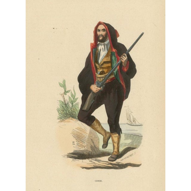 This powerful image portrays a Corsican man in traditional dress, armed with a long firearm and posed against a coastal...