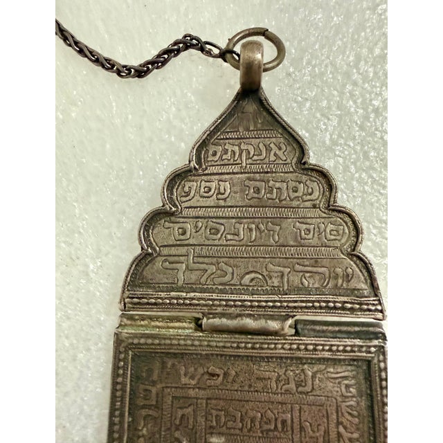 Antique Middle Eastern Judaic Birth Amulet Buckle with Kabbalistic Inscription. On woven silver chain. Most likely from...