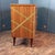 A rare Italian mid-century chest of drawers from the 1950s/60s, crafted in warm rosewood veneer and designed in the style...
