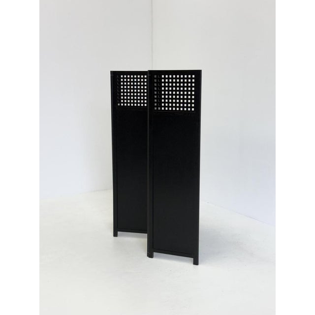 This elegant room divider, designed by Umberto Asnago for Giorgetti , is a refined example of Italian design where...