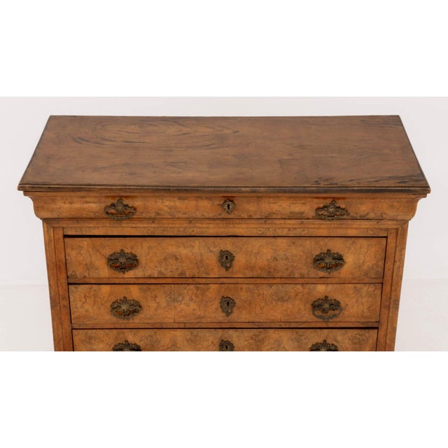 Louis Philippe Burl Walnut Commode, 19th century, with four drawers on four bracket feet. 37" H x 45.75" W x 19.5" D....