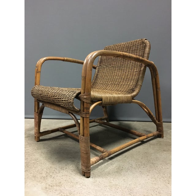 A well documented rare Dieckmann chair in very good condition, it has a beautifully made leather snake skin seat cushion....